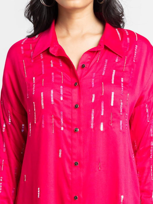 Close up of shirt collar and sequin embroidery on front of fuchsia Emile Shirt showing glossy modal satin fabric