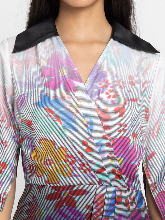 Close up of V-neck and contrast collar wrap panel detail on black floral satin Florale Dress with soft flowy fabric