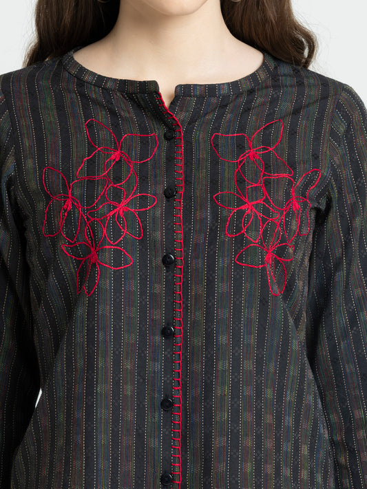 Close up of round neck and thread embroidery on front of black Jessup Shirt with stitch embroidery on placket