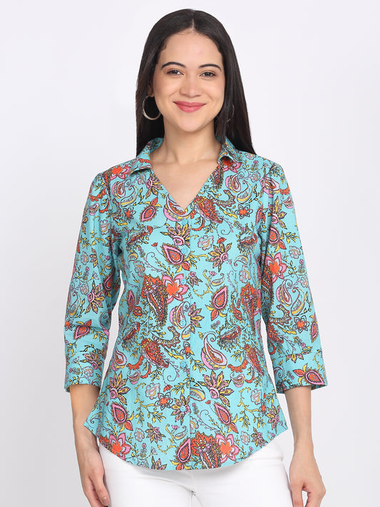 Blue paisley print cotton shirt with v-neck and collar, three-quarter sleeves with cuff, button down front, curved hem, relaxed fit front view
