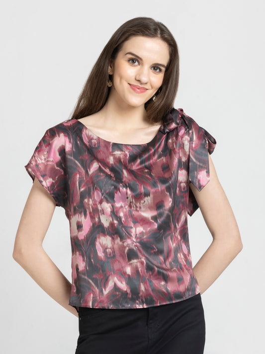 Shaye mauve printed top satin boat neck short extended sleeves printed shoulder knot curved hem relaxed fit front view for women