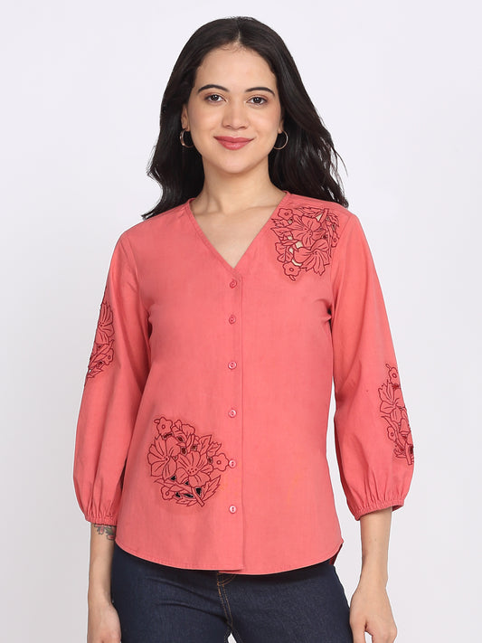 Coral embroidered cotton shirt with v-neck, button down front, three-quarter elasticated sleeves, floral embroidery at chest and sleeve, curved hem, relaxed fit front view