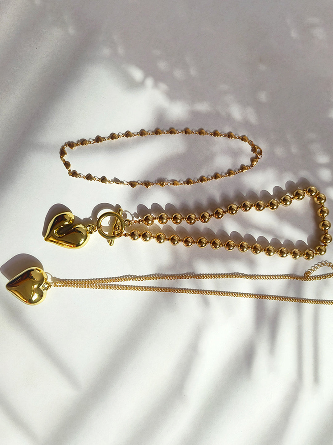 Golden Statement Heart Layer Necklace from Shaye India , Jewellery for women