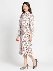 Model in Abigail Shirt Dress three quarter front pose highlighting relaxed fit floral print and satin fabric