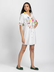 Side profile of Adira Dress highlighting relaxed fit floral print short sleeves and tie up waist detail