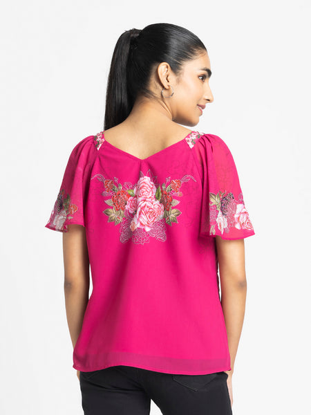 Rear view of Ambre Top showing flared sleeves printed georgette fabric and comfortable relaxed fit