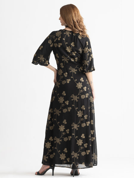 Back view of black Bondi foil print dress with fit and flare silhouette and included scarf
