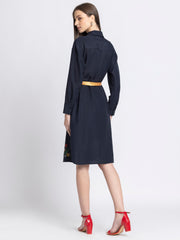 Rear view of black floral print dress with three-quarter slit sleeves pleated detail straight hem and relaxed fit satin fabric