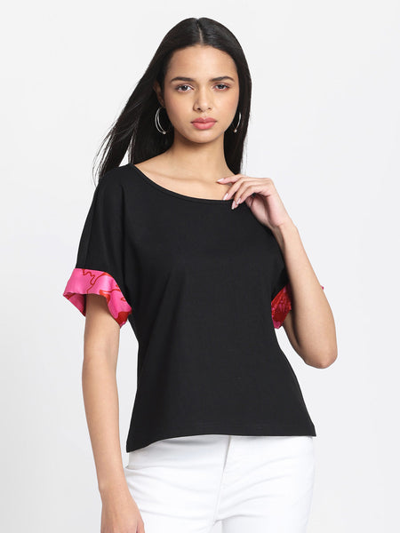 Black Laurina t-shirt with scoop neck and pink contrast sleeves - relaxed fit women's jersey top front view