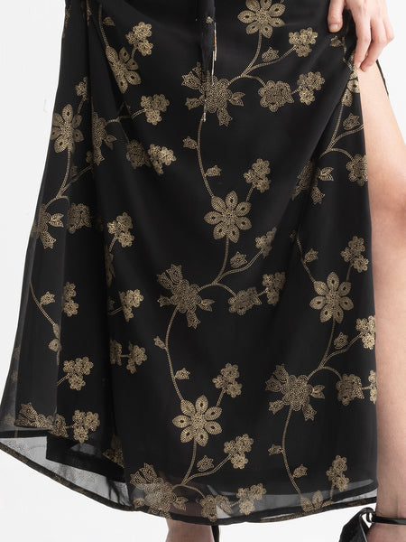 Close view of black Bondi dress showing side slit on bottom
