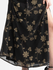 Close view of black Bondi dress showing side slit on bottom