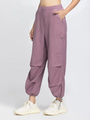 Side profile of Capri Pants showing relaxed fit cargo pockets and elasticated trouser with high-rise waist