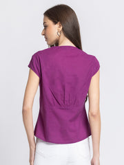 Rear view of Elvira Top revealing cap sleeves relaxed fit and breathable purple cotton fabric