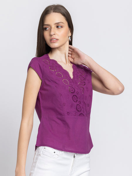 Model side pose in Elvira Top showing Schiffli embroidery straight hem and soft breathable cotton material