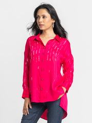 Model wearing Emile Shirt with flowing hair showing button down front and sequin embroidery on modal satin