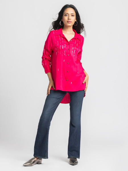 Full body view of Emile Shirt paired with jeans showing relaxed fit high low hem and adjustable dori at back