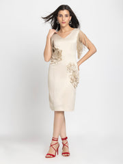 Beige satin sheath party dress with V-neck, fringes on sleeves with sequin embroidery, floral sequin patches, fitted silhouette, front view