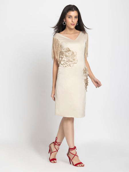 Side view of beige satin sheath dress with fringed sleeves, sequin embroidery, fitted shape, straight hem