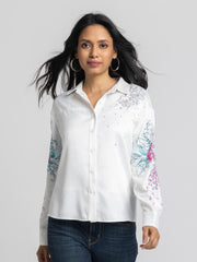 Model wearing white satin Georgia Shirt with floral print spread collar full cuff sleeves and curved hem