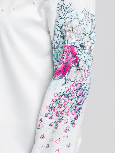 Close up of sequin embroidery on full cuff sleeve of Georgia Shirt showing intricate floral print and satin sheen
