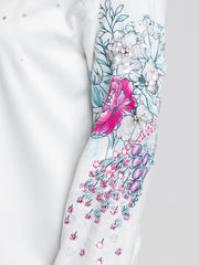 Close up of sequin embroidery on full cuff sleeve of Georgia Shirt showing intricate floral print and satin sheen