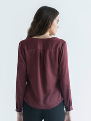 Rear view of brown Gramercy Shirt showing curved hem regular fit and smooth satin fabric