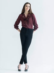 Full body shot of model in brown Gramercy Shirt paired with black pants showing regular fit curved hem