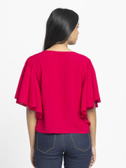 Rear view of Jacqueline Shirt with short flared sleeves relax fit curved hem and natural breathable fabric