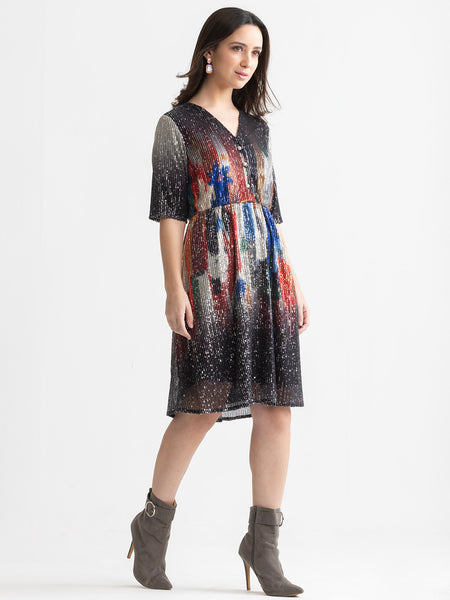 Left side view of beige Jamie fit-and-flare dress showing short sleeves and side seam detail