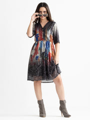 Beige Jamie sequin party dress styled with ankle boots and scarf accessory for evening look