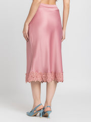 Rear view of Kagura Skirt showing bias cut lace detail at hem relaxed fit and lightweight satin fabric