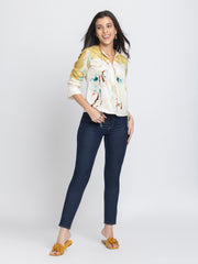 Full body shot of Karissa Top paired with jeans showing relaxed fit curved hem and comfortable cotton fabric