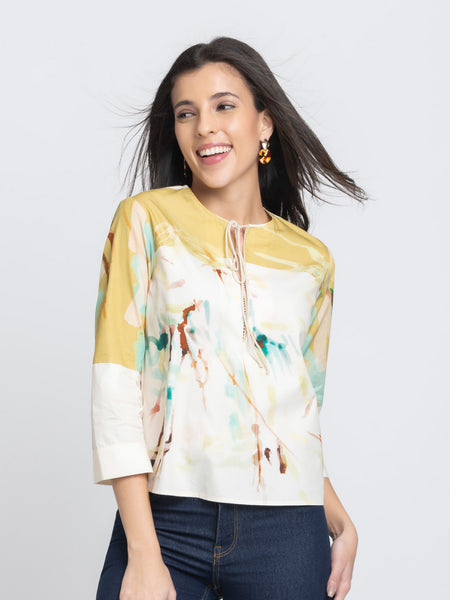 Side profile of Karissa Top showing relaxed fit lightweight cotton fabric printed design and three quarter sleeves