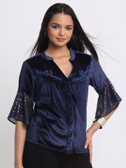 Side view of Lexie Shirt highlighting frill sleeve hem and smooth velvet drape