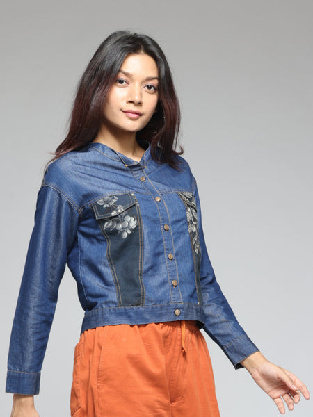 Side angle blue denim shirt, round neck, print patch detail, full sleeves, button down, relaxed fit