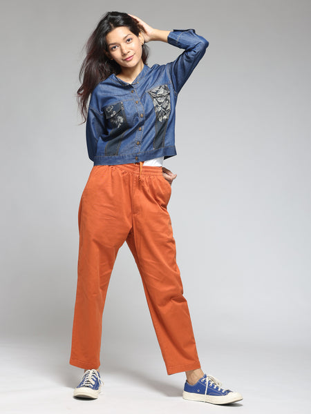 Full body view blue denim shirt with print patch, round collar, full sleeves, button front, straight hem, relaxed fit