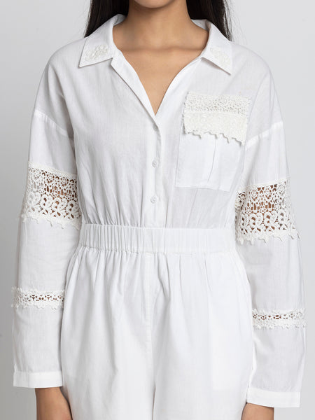 Close up of spread collar lace patch detail and patch pocket on white cotton Maleah Playsuit