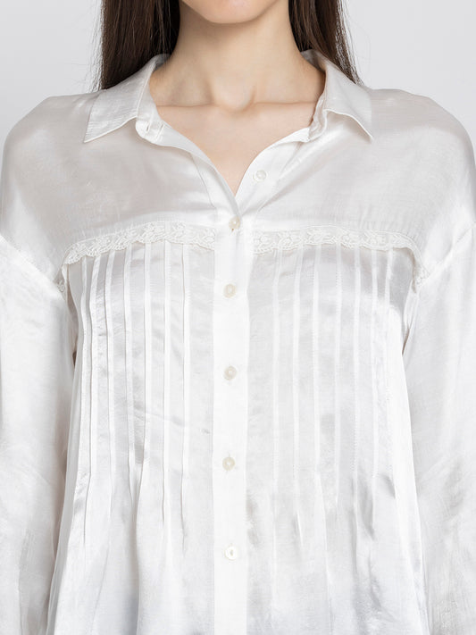 Close up of shirt collar and lace pintucks on front of white satin Minnie Shirt showing luxurious fabric