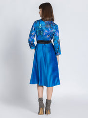 Rear view of Olga Dress showing belt and pleated skirt in lightweight satin fabric with floral print