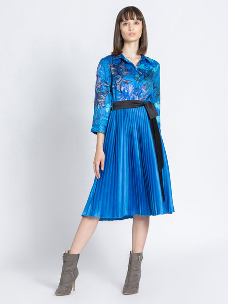 Full length front view of Olga Dress showing pleated skirt belt and relaxed fit in satin fabric