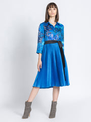 Full length front view of Olga Dress showing pleated skirt belt and relaxed fit in satin fabric