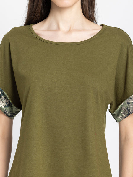 Detail view of olive green Riya jersey t-shirt showing soft fabric texture and scoop neckline construction quality