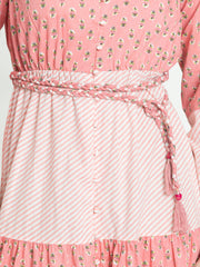 Close-up of elasticated waist with belt on pink cotton dress