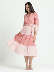 Pink tiered cotton dress with full elasticated sleeves and belt