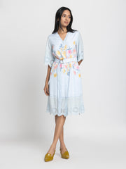 Right side profile of light blue Poetry dress highlighting relaxed fit and belted waist detail