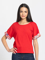 Red Thea knit t-shirt with scoop neck and floral printed sleeves - relaxed fit women's jersey top front view