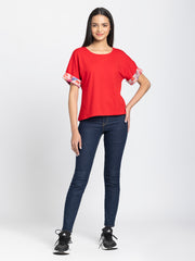 Red Thea t-shirt styled casually with dark jeans - comfortable scoop neck jersey top outfit inspiration