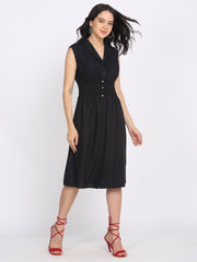 Alternate movement image black rayon dress, shawl collar, button down, smocked waist, straight hem, relaxed fit, model pose