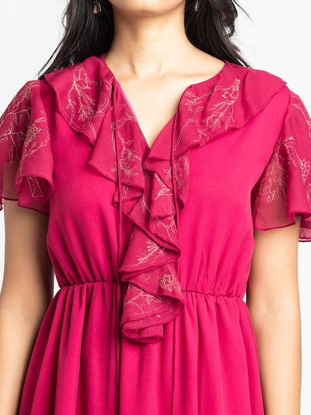 Close up of V-neckline ruffle and tie up detail on dark pink chiffon Sebastina Dress with short flared sleeves