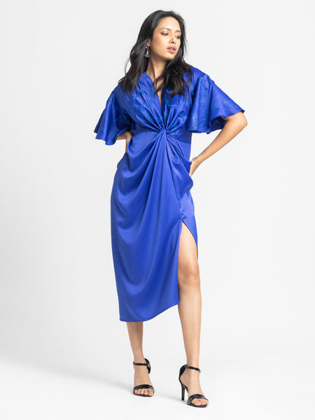 Full body pose blue satin twist front draped dress, V-neck, short flared sleeves, straight hem, relaxed fit